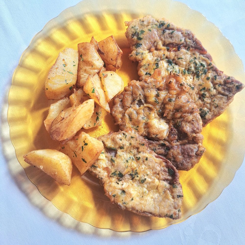 mesa-habla-parador-alcala-cuentame-escalopines-madrilena